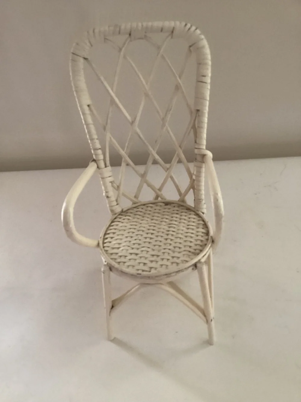 Mini off-white wicker chair for decor or doll/stuffed animal display